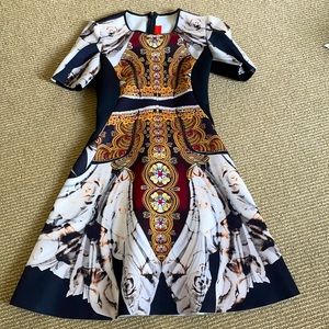 Gold design clover canyon dress.